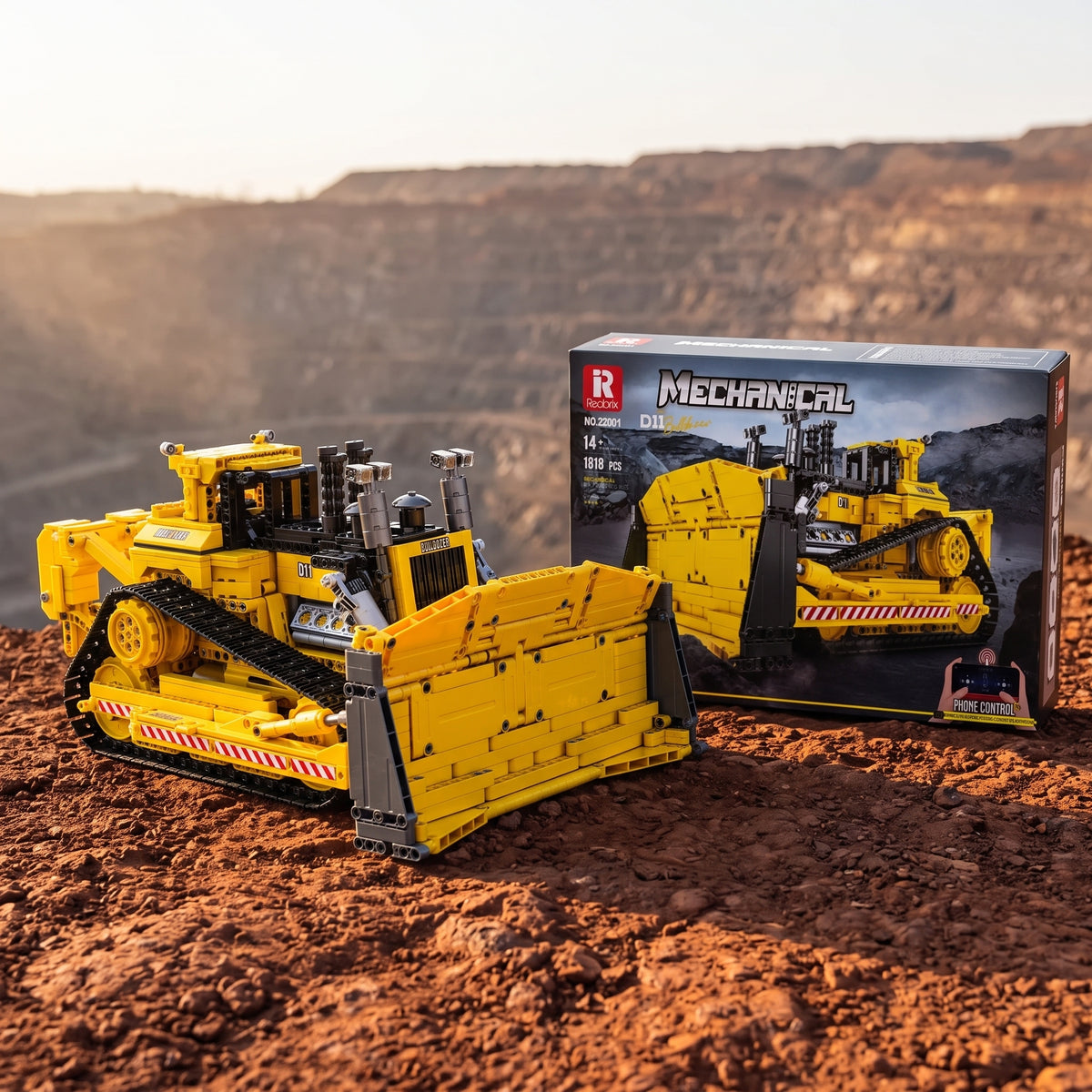Reobrix 22001A RC track bulldozer building set — built model with its box in a quarry scene