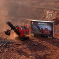 Reobrix 22014 RC electric mining shovel building set — built model with its box in a quarry scene