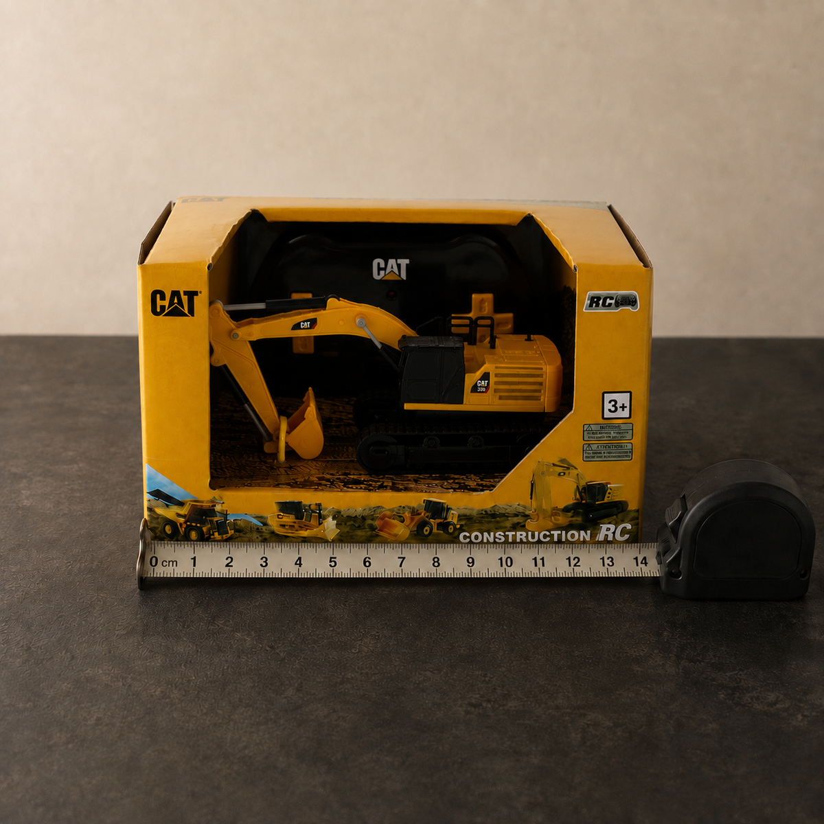 Mini CAT 336 excavator 1:64 RC — front of the box