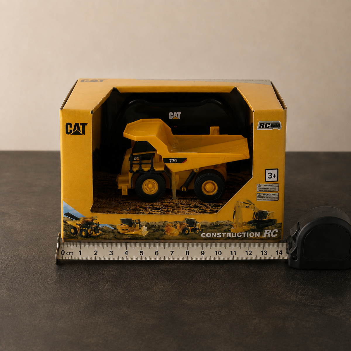 Mini CAT 770 mining truck 1:64 RC — front of the box