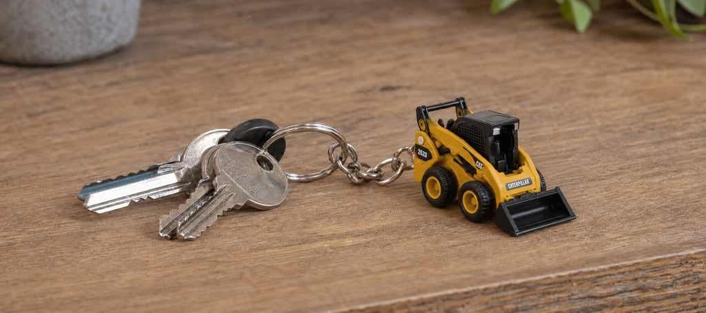 CAT skid steer loader keyring on a set of keys