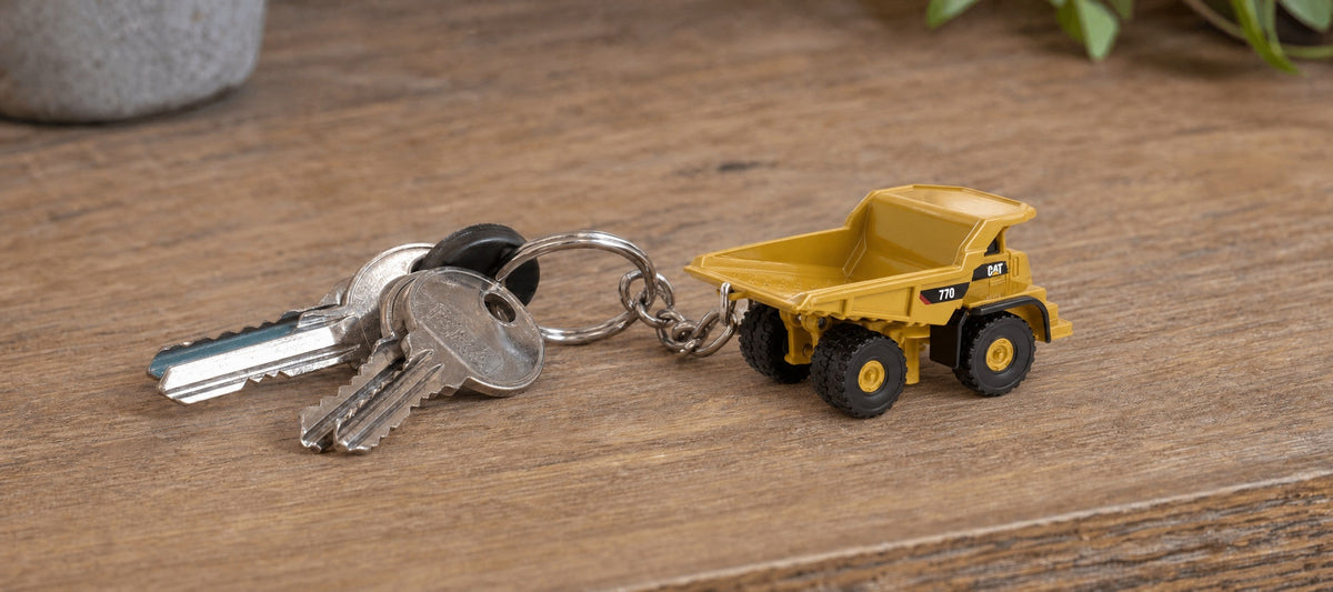 CAT mining truck keyring on a set of keys