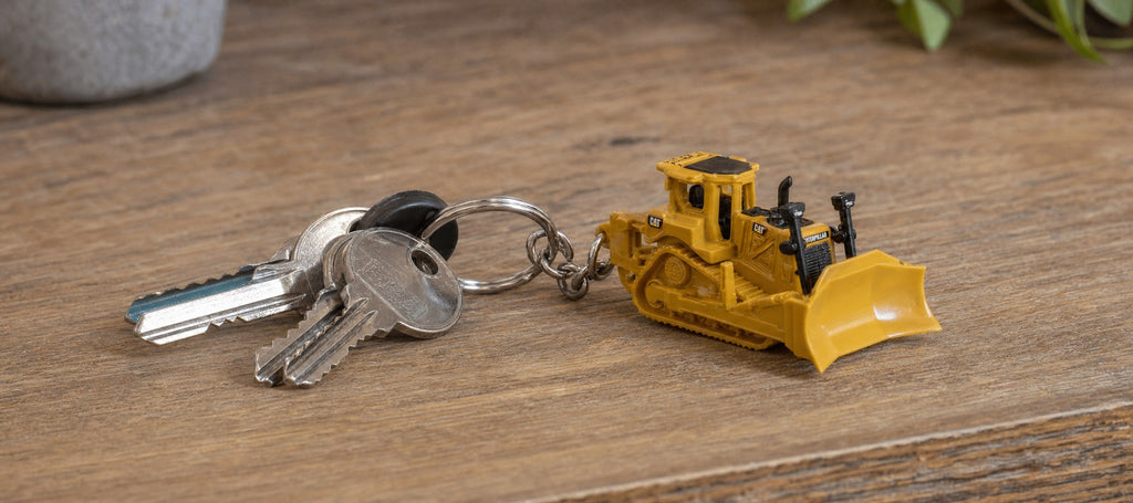 CAT track-type tractor keyring on a set of keys