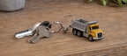 CAT dump truck keyring on a set of keys