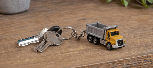 CAT dump truck keyring on a set of keys