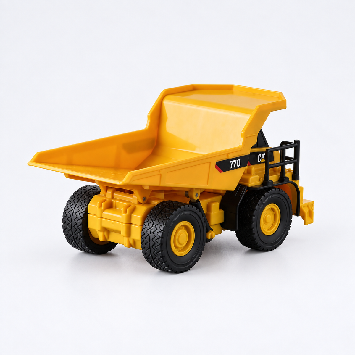 Mini CAT 770 mining truck 1:64 RC — rear three-quarter view