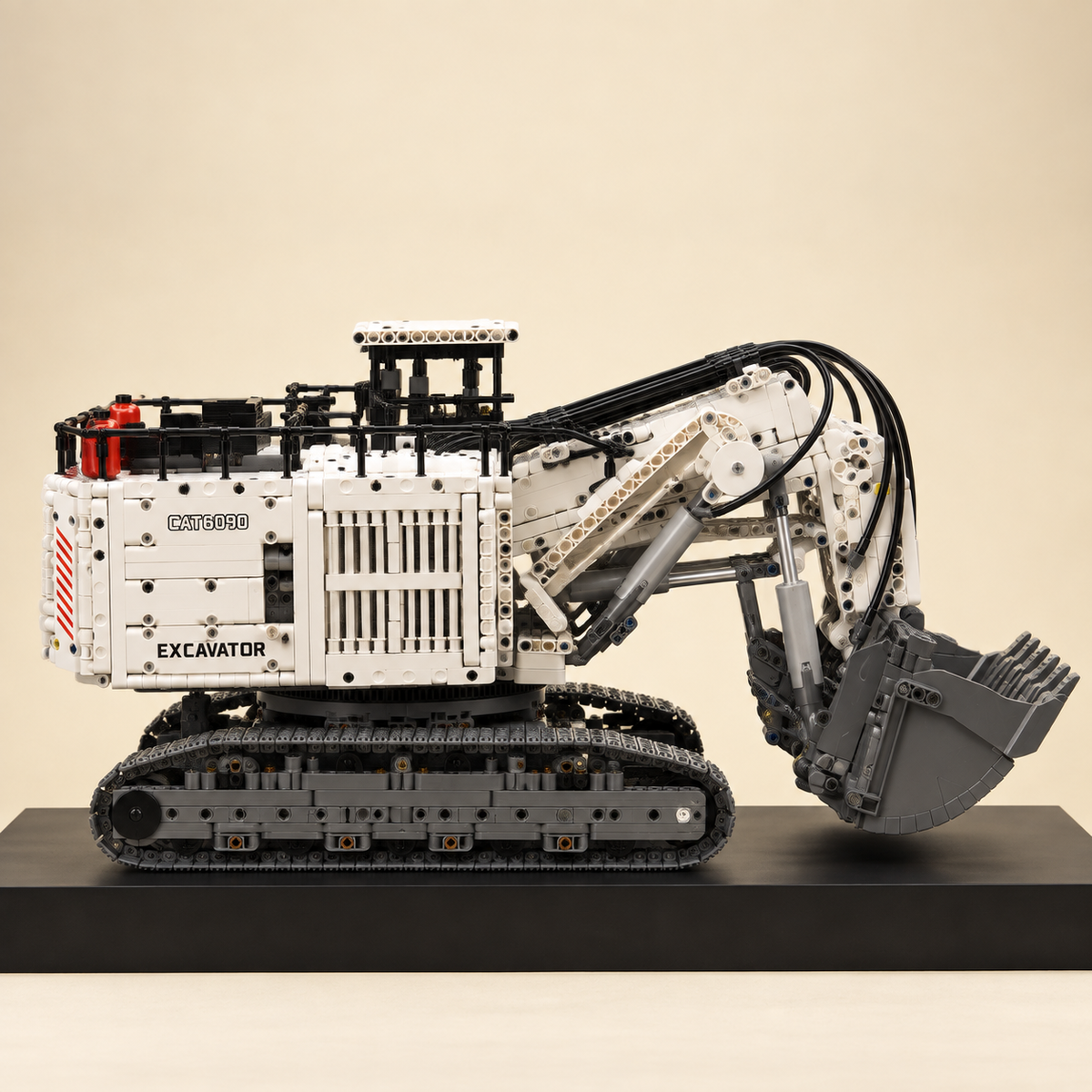 Mould King 17067 RC mining shovel excavator building set — built model on display base, front view