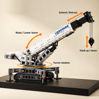 Mould King 17002 RC crawler crane building set — built model on display base with function callouts
