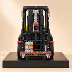 Mould King 13106 RC forklift truck building set — built model on display base, front view