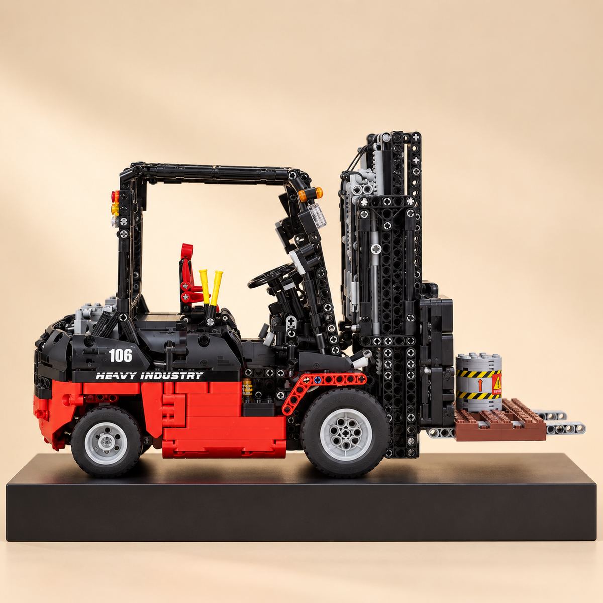 Mould King 13106 RC forklift truck building set — built model on display base, front three-quarter view