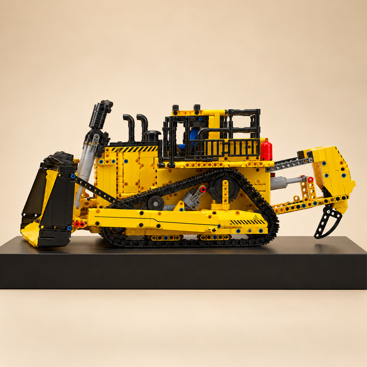 Mould King 15084 RC large track bulldozer building set — built model on display base, front three-quarter view