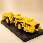 Mould King 17056 underground mine loader building set — built model on display base, side view