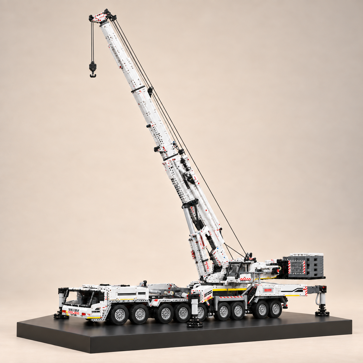 Mould King 17007 9-axle mobile crane building set, white — built model on display base, telescopic boom raised
